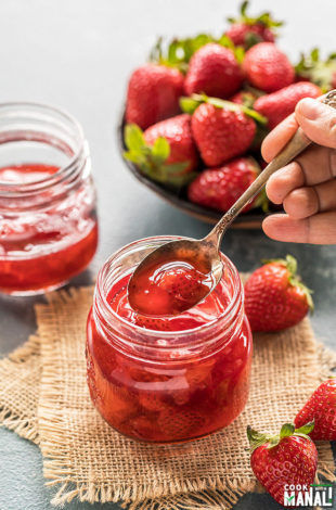 homemade strawberry syrup in a mason jar
