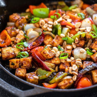 kung pao tofu served in a cast iron skillet