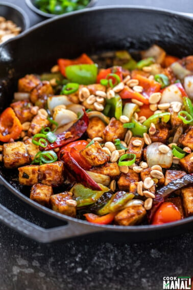 kung pao tofu served in a cast iron skillet