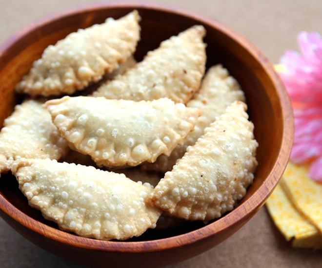 wooden bowl with gujiya