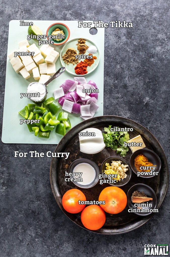 ingredients for paneer tikka masala arranged on a board