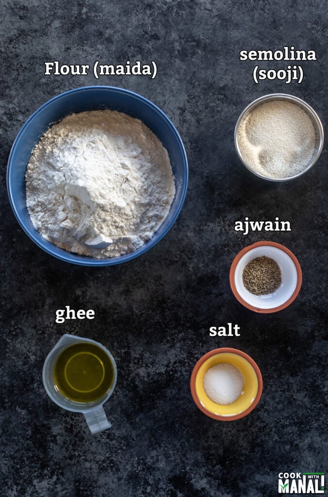 ingredients for making namak para arranged on a board