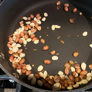 raw peanuts in a pan