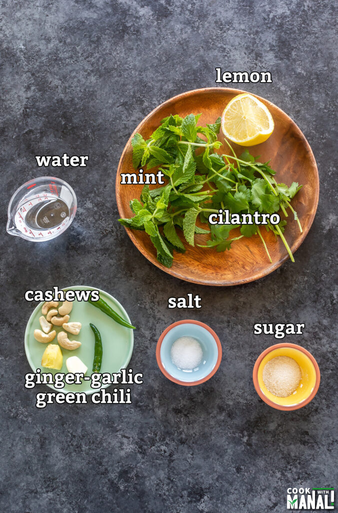 ingredients for mint chutney arranged on a board