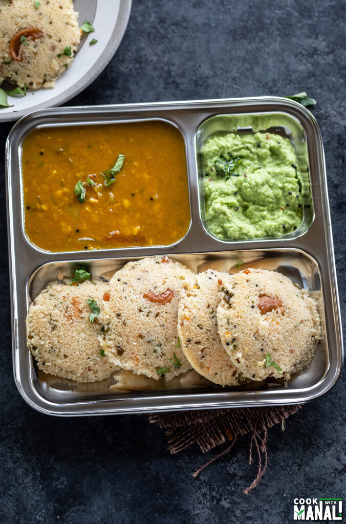 idlis with sambar and chutney in a thali
