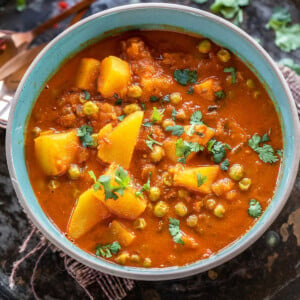 aloo matar served in a blue color bowl