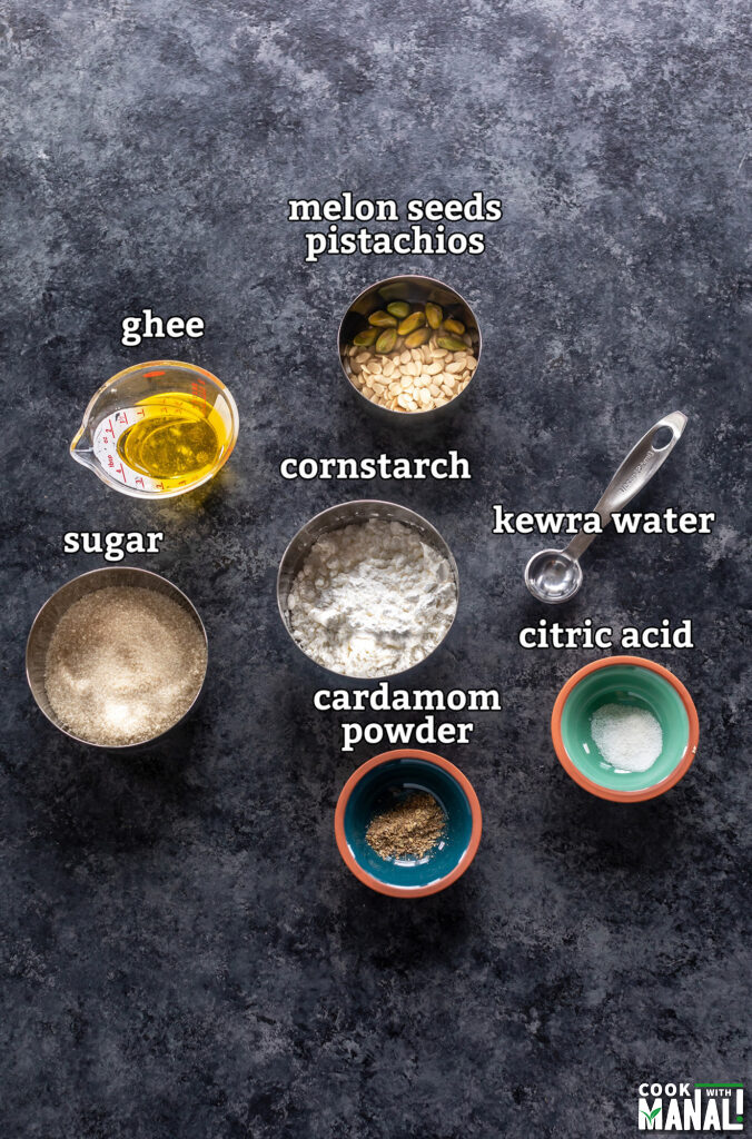 ingredients to make karachi halwa arranged on a board