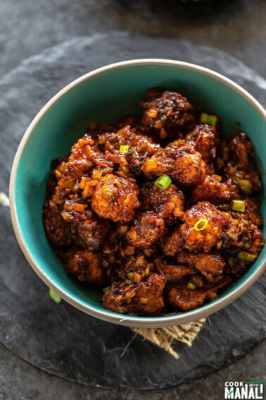 gobi manchurian served in a blue bowl