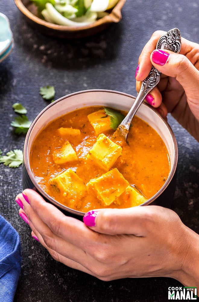 creamy butter paneer garnished with cilantro