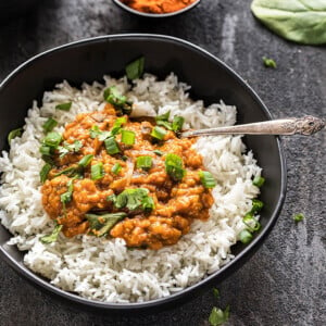 Instant Pot Ethiopian Lentil Stew with rice in a black bowl