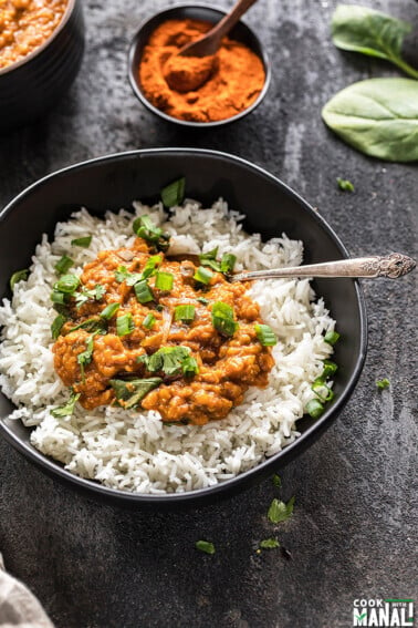 Instant Pot Ethiopian Lentil Stew with rice in a black bowl