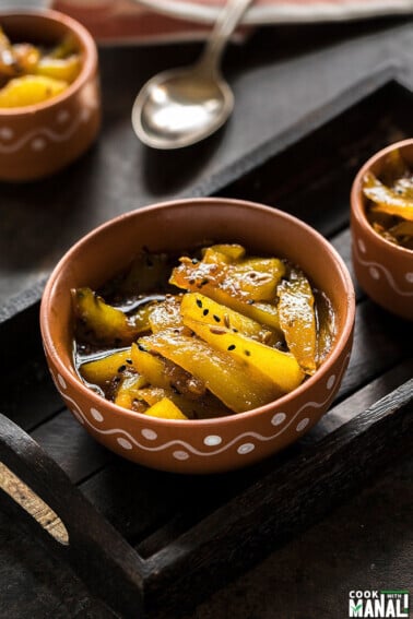 aam ki launji in a traditional clay bowl