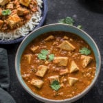 instant pot tofu tikka masala served in a blue bowl and garnished with cilantro