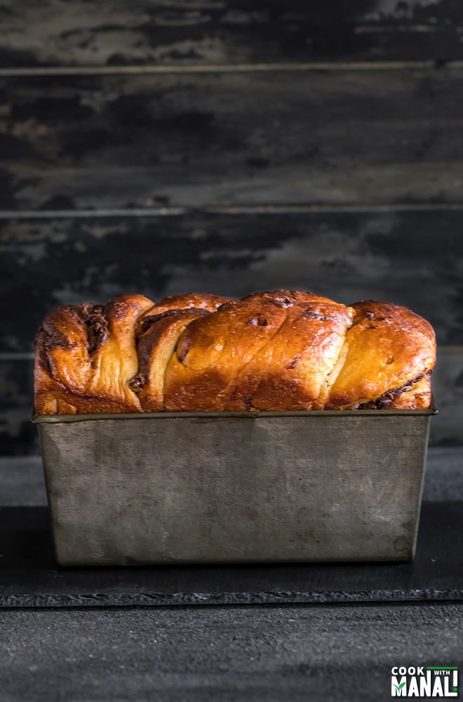 loaf of nutella babka in an antique loaf pan