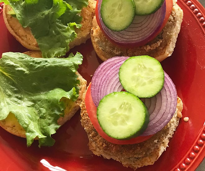 vegetable burgers on a red plate