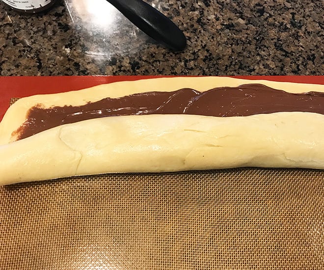 nutella babka dough rolled into a log