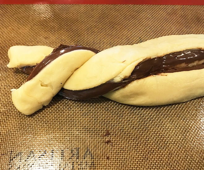 nutella babka dough being braided