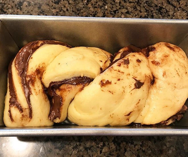 babka dough in a baking pan