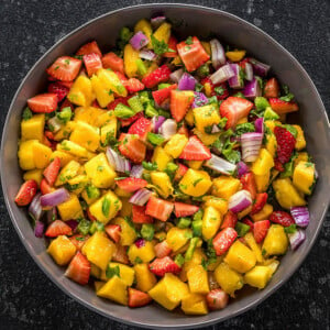 strawberry mango salsa in a large grey bowl