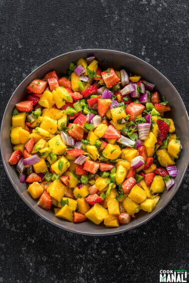 strawberry mango salsa in a large grey bowl