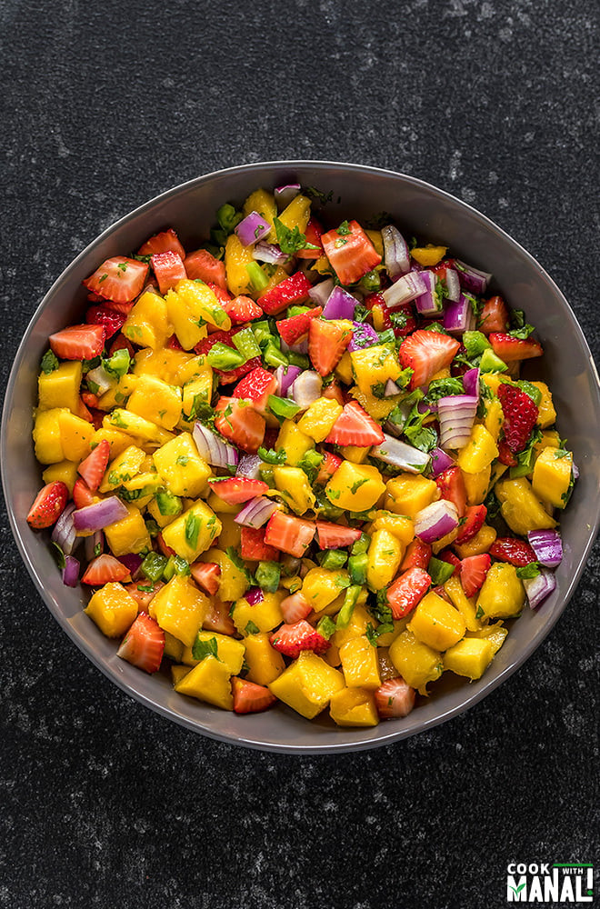 strawberry mango salsa in a large grey bowl