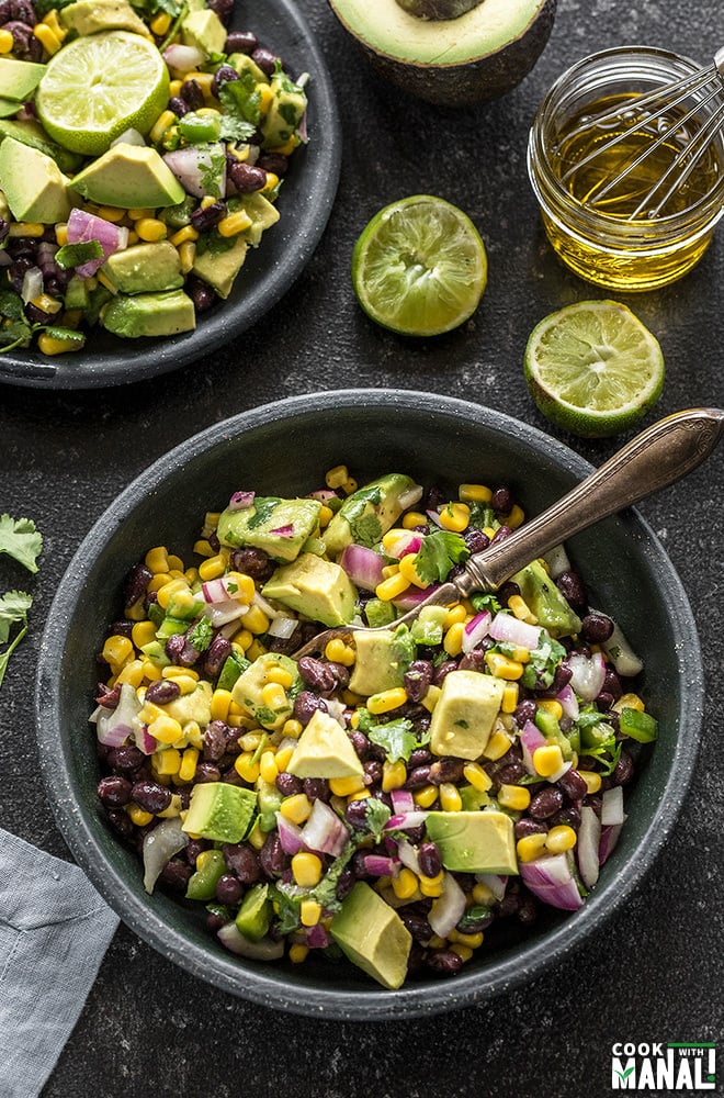 black bean corn salad served in a black bowl