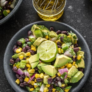 black bean corn salad in a black bowl