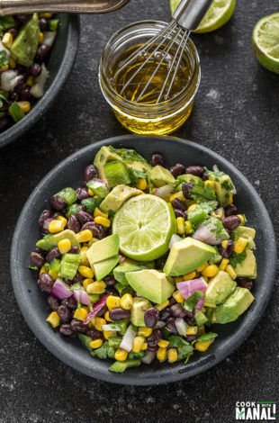 black bean corn salad in a black bowl