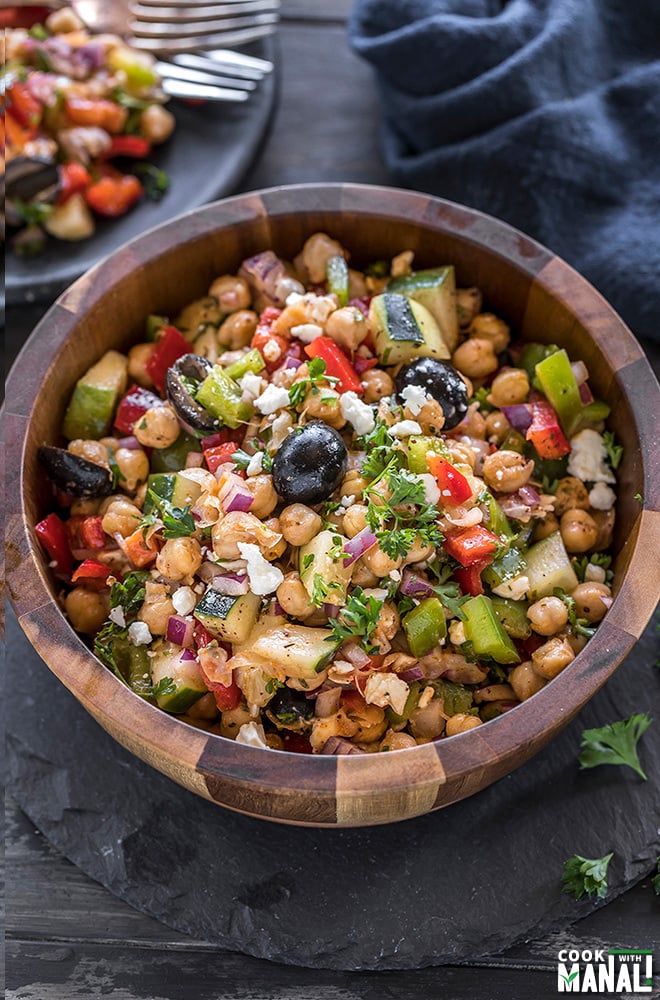 mediterranean chickpea salad in a large wooden bowl