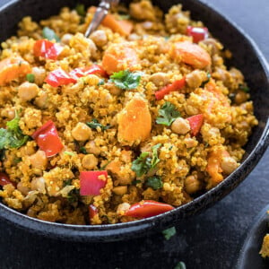 sweet potato chickpea quinoa in a black bowl