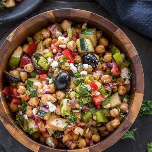 mediterranean chickpea salad in a large wooden bowl