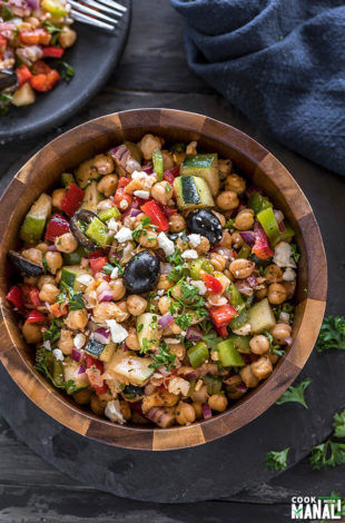 mediterranean chickpea salad in a large wooden bowl