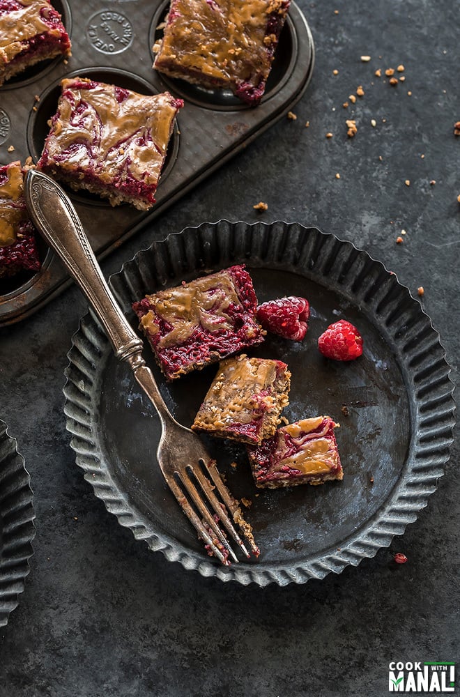 vegan peanut butter & jelly bars with a fork