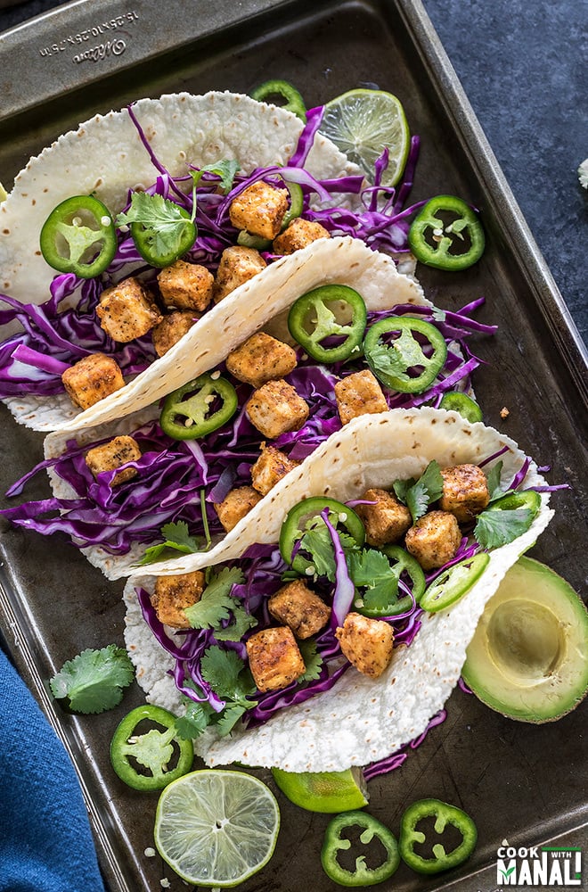 3 crispy tofu tacos topped sliced jalapenos