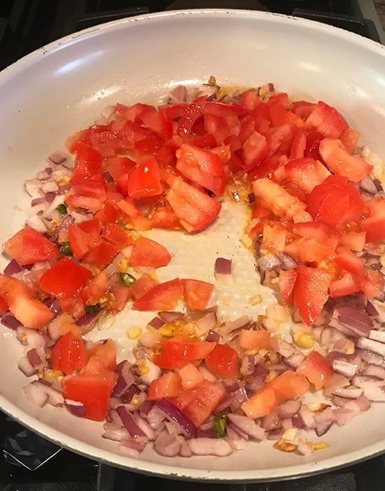 chopped tomatoes in a pan