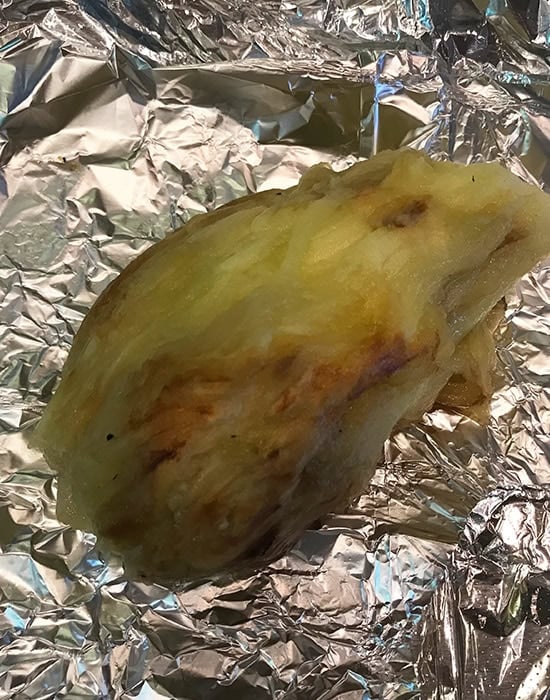 roasted and peeled eggplant place on a foil
