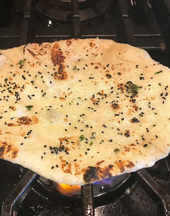 cooking naan on direct heat