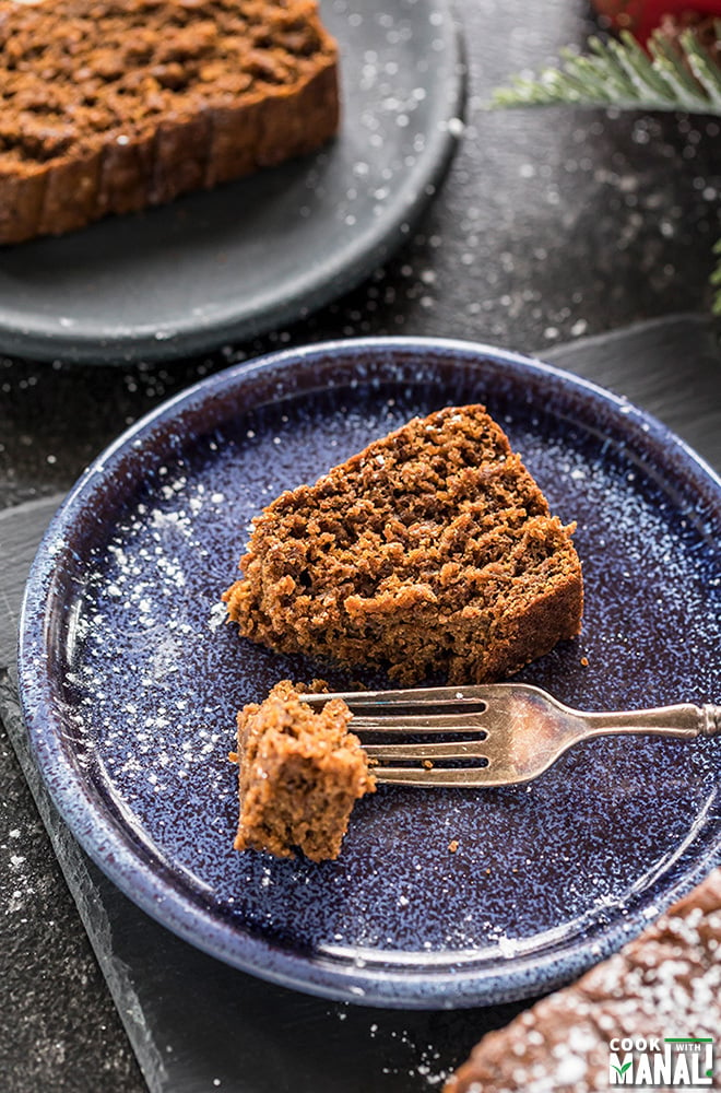 slice of vegan gingerbread cake being cut with a fork