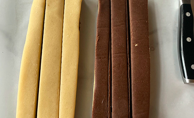 cut strips of alternating vanilla and chocolate cookie dough