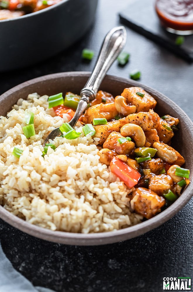 bowl of honey cashew tofu with brown rice