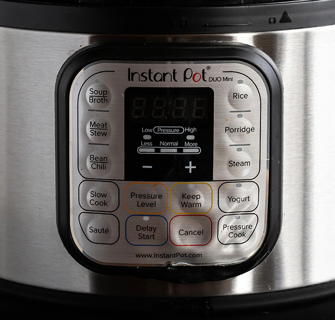 photographs of buttons on the instant pot