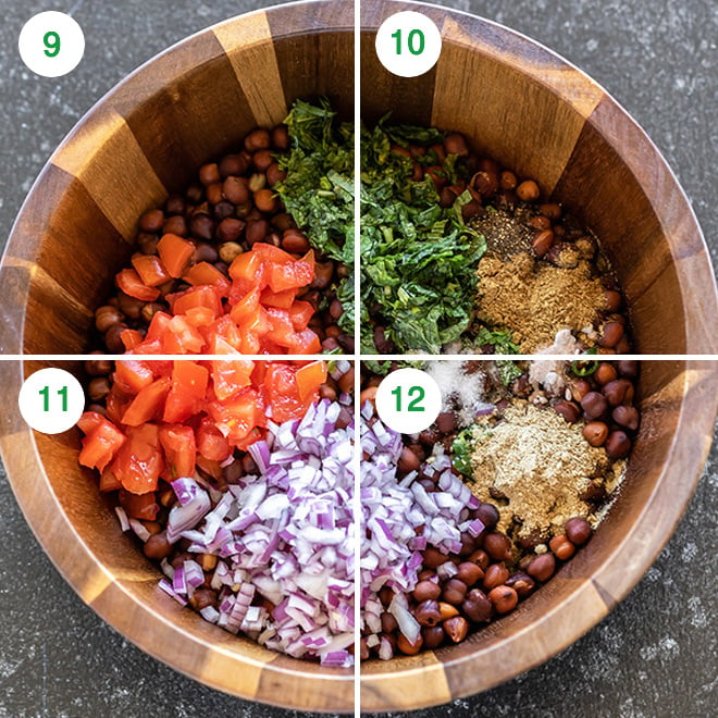 black chickpeas with chopped onion, tomato, cilantro and spices in a wooden bowl