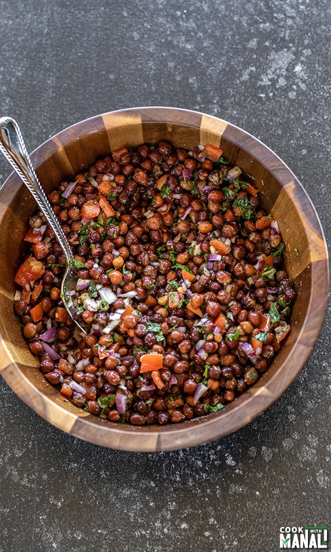 kala chana chaat in a big wooden bowl