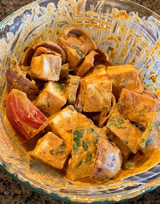 marinated paneer cubes with veggies in a bowl