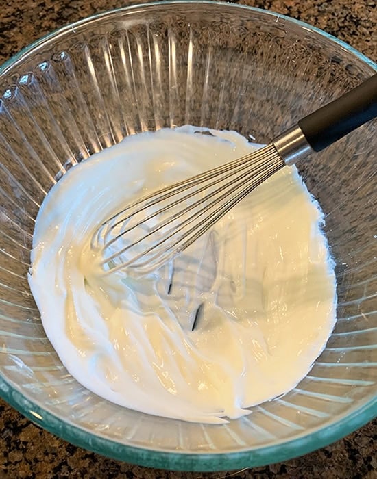whisked yogurt in a bowl