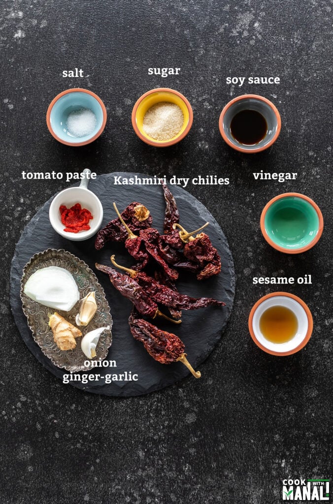 ingredients for schezwan sauce arranged on a board