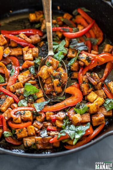 cast iron pan with basil tofu stir fry