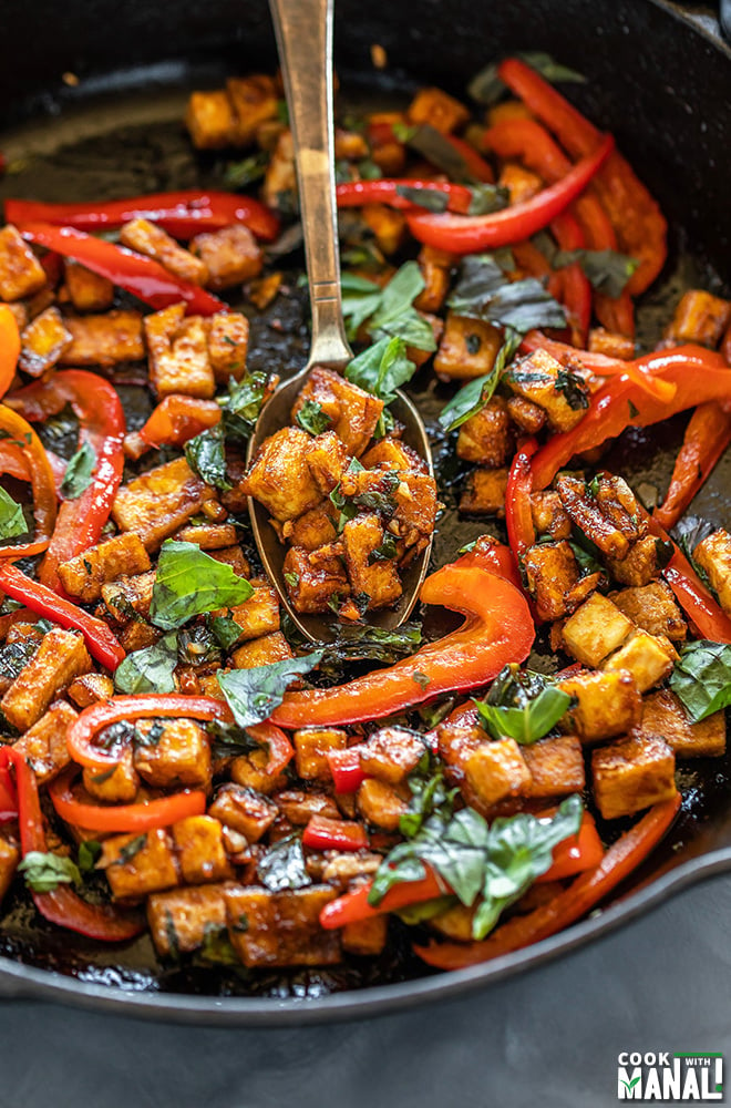 cast iron pan with basil tofu stir fry 