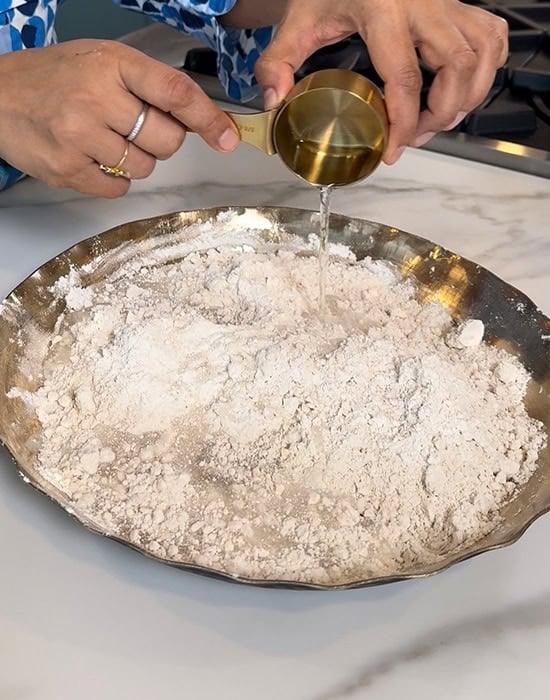 adding water to flour