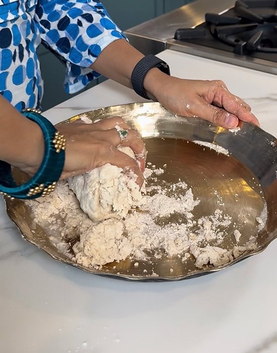kneading dough with hands